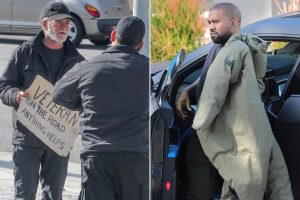 Calabasas, CA  - *EXCLUSIVE*  - Kanye West stops his car and tells his bodyguard to give money to veteran homeless standing on a freeway exit in Calabasas. Pictured: Kanye West's Security BACKGRID USA 15 JANUARY 2020  USA: +1 310 798 9111 / usasales@backgrid.com UK: +44 208 344 2007 / uksales@backgrid.com *UK Clients - Pictures Containing Children Please Pixelate Face Prior To Publication* Calabasas, CA  - Rapper turned preacher Kanye West looks all bundled up while arriving at his office in Calabasas on this Wednesday afternoon. Pictured: Kanye West  BACKGRID USA 15 JANUARY 2020  BYLINE MUST READ: RAAK/JACK / BACKGRID USA: +1 310 798 9111 / usasales@backgrid.com UK: +44 208 344 2007 / uksales@backgrid.com *UK Clients - Pictures Containing Children Please Pixelate Face Prior To Publication*