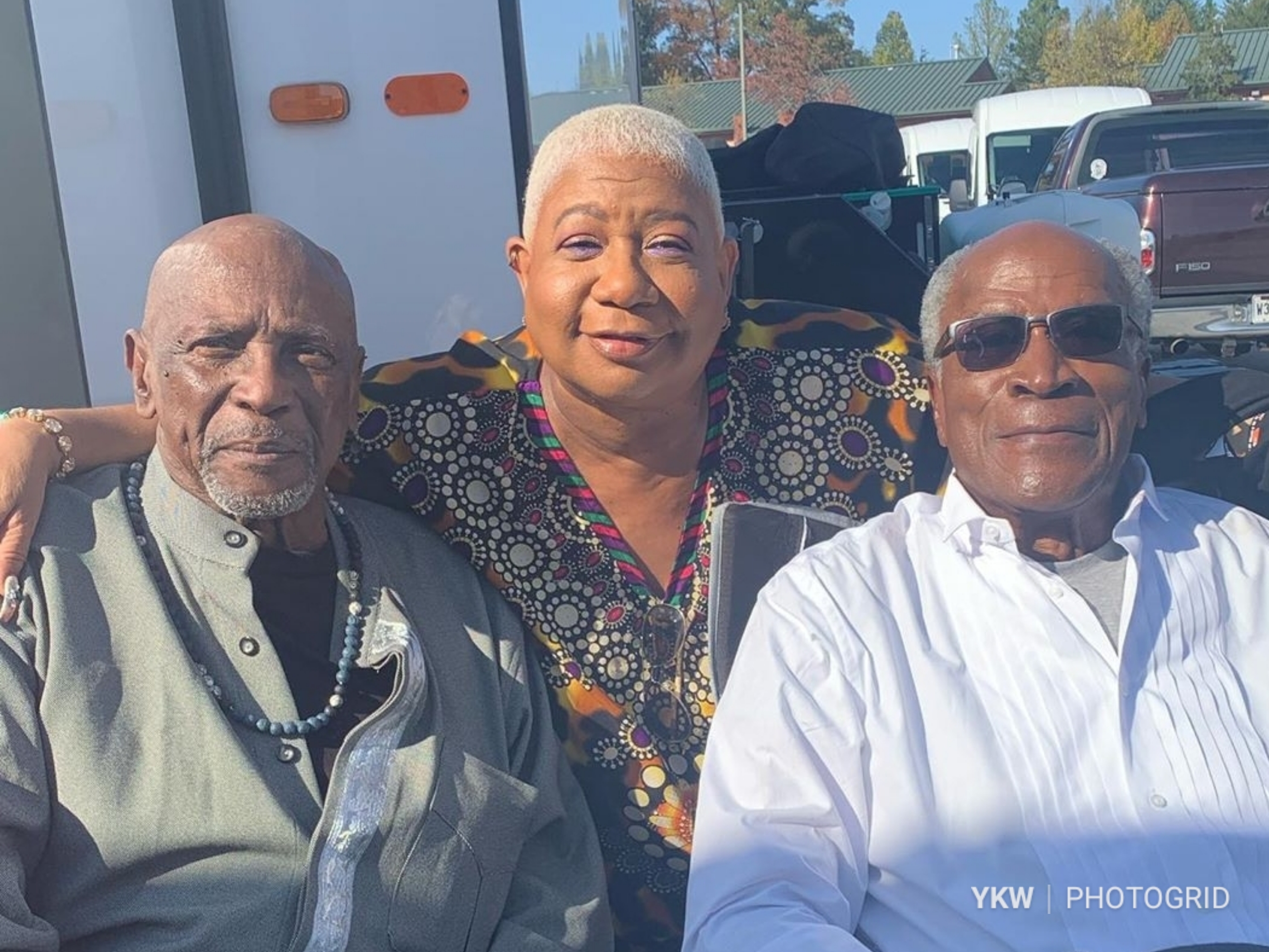 Luenell Posted Up With Legends Louis Gossett, Jr. And John Amos On ‘Coming 2 America’ Set