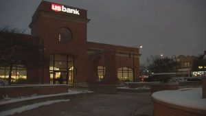 elderly couple leaves bank