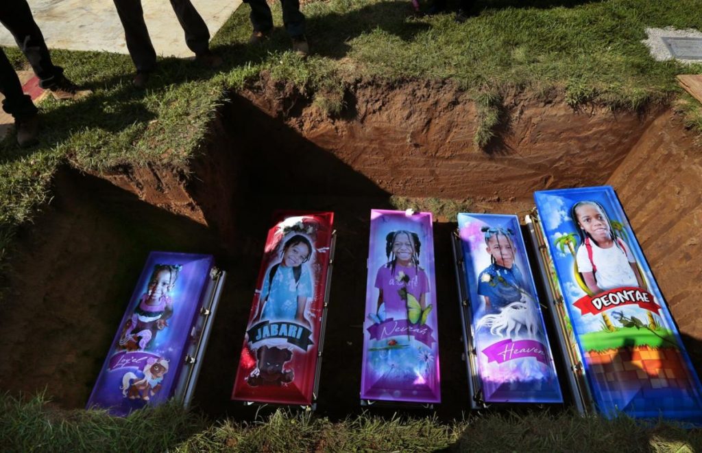 Children killed in fire coffins.